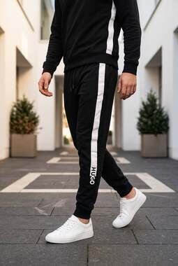 HUGO youth Black Sweatpants with White Side Stripe Logo size large